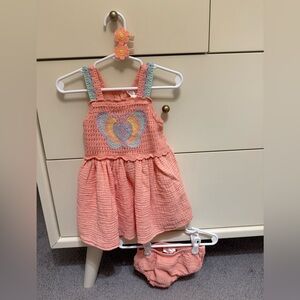 Peach Crochet Baby Dress with Rainbow Design